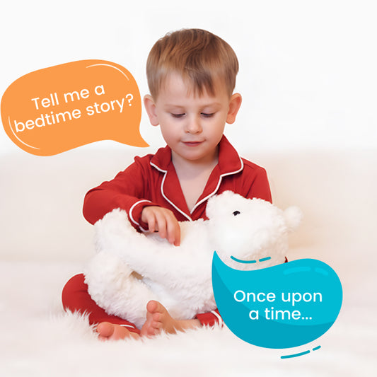 Child in red pajamas holding a TalkiPal AI plush toy cat Luna with text bubbles asking for a bedtime story.